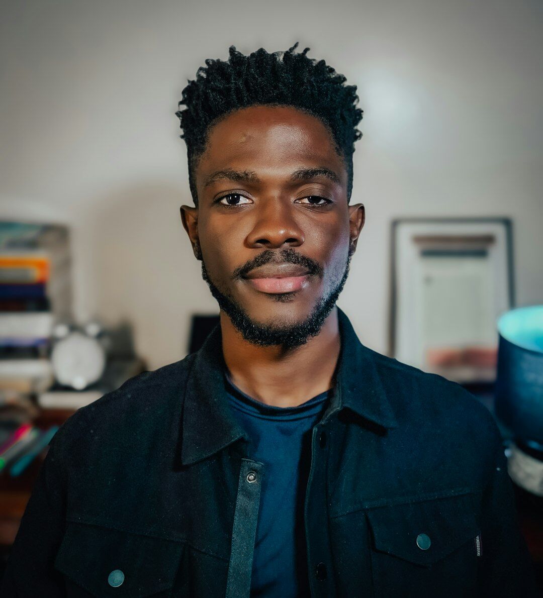 Portrait of a smiling young male reporter