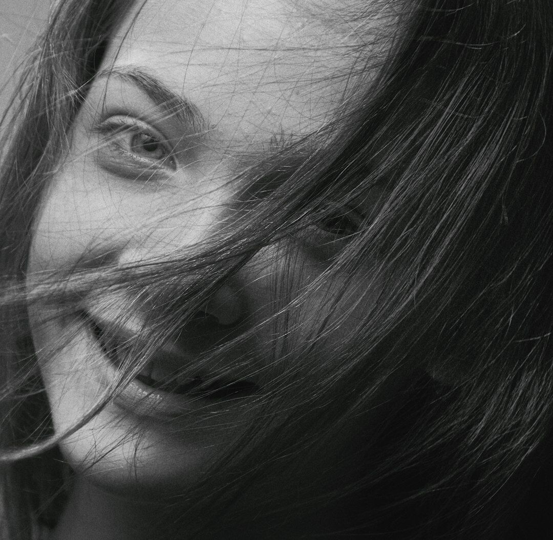 Portrait of a smiling woman editor