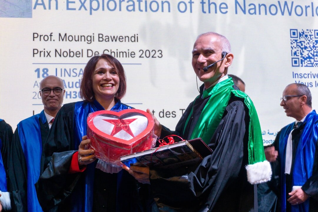 two celebrities at award ceremony